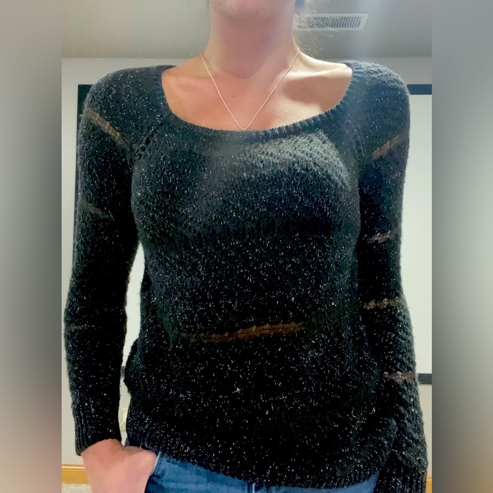 Charcoal gray long sleeve sheer top. Loose and comfortable fit